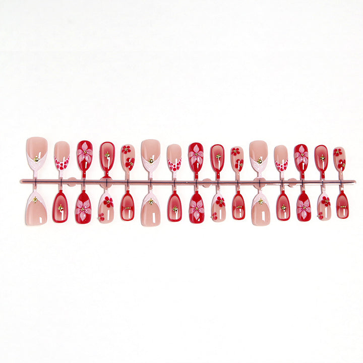 Artificial nails with floral design and glamorous accents Kalsten