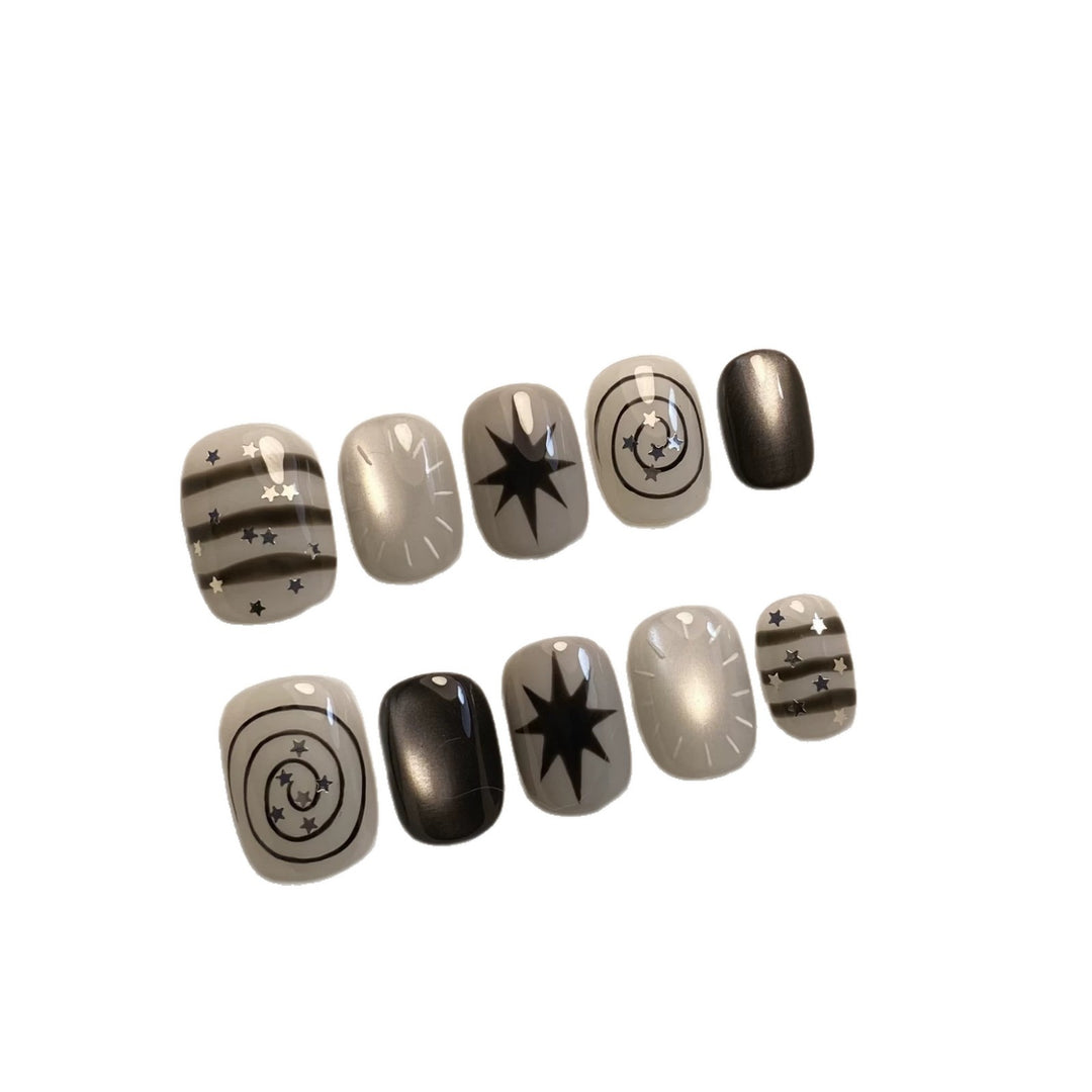 Artistic Press-On Nail Art Set with Celestial Designs