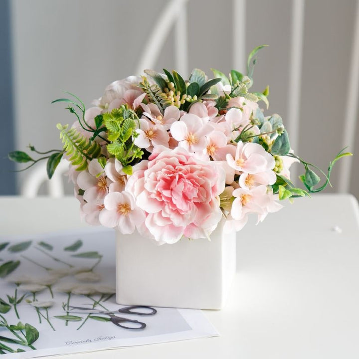 Lifelike Floral Arrangement in Decorative Square Planter