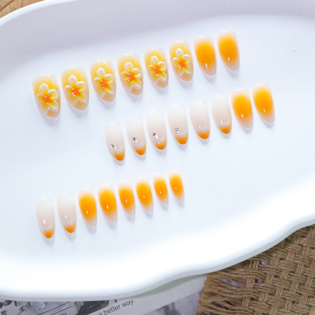 Artful nail extensions with delicate ombre effect and floral accents Kalsten
