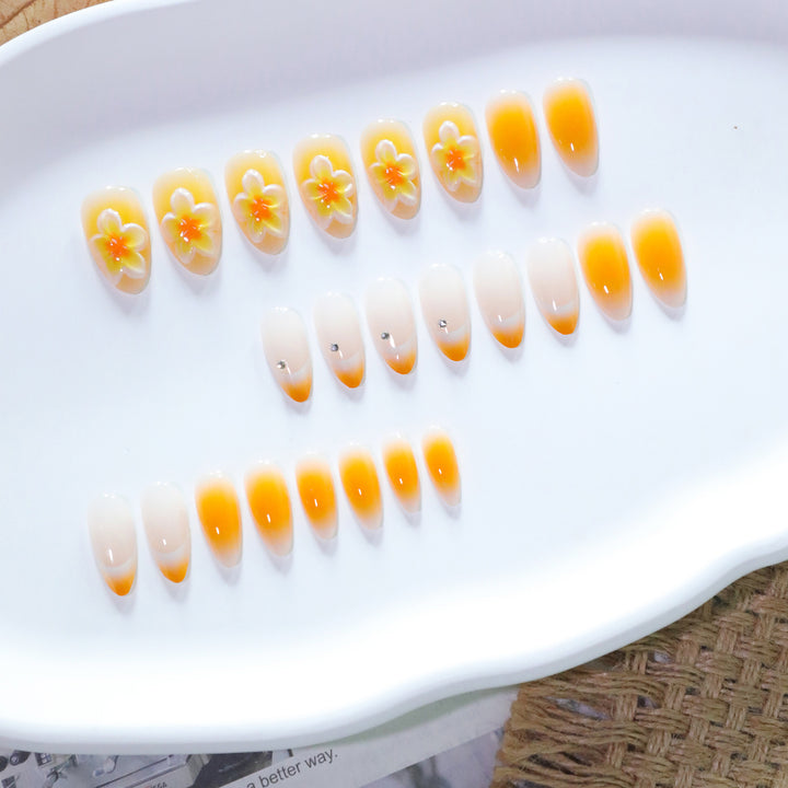 Artful nail extensions with delicate ombre effect and floral accents Kalsten