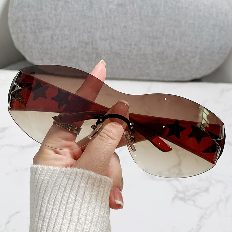 Women's stylish sports sunglasses with half-frame and striking star accents Kalsten