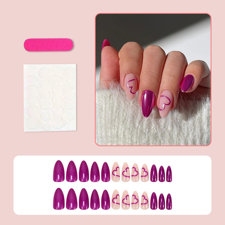 Artificial nail set with romantic heart design and glamorous accents Kalsten