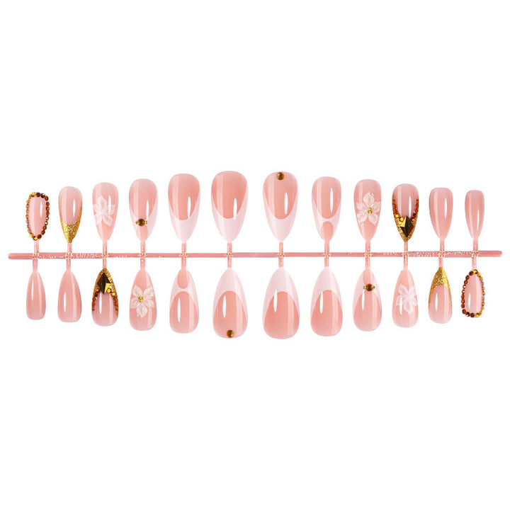 Artificial nail set with elegant flower and gold accents Kalsten