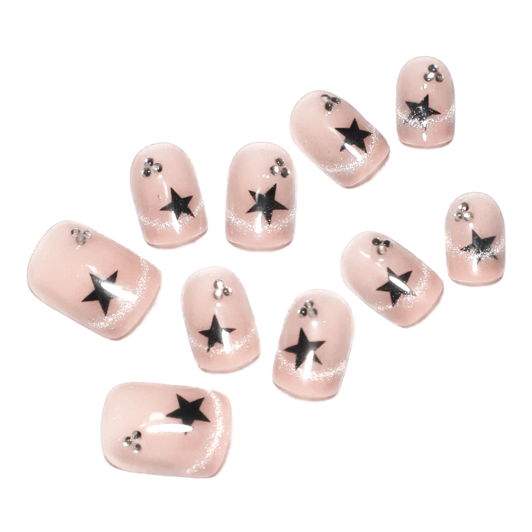 Artistic acrylic nails with glamorous star motifs Kalsten