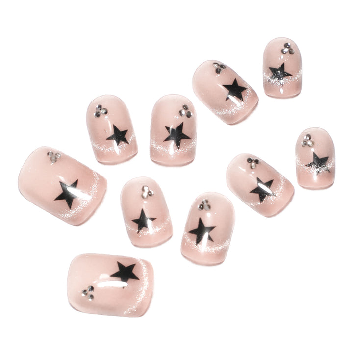 Artistic acrylic nails with glamorous star motifs Kalsten