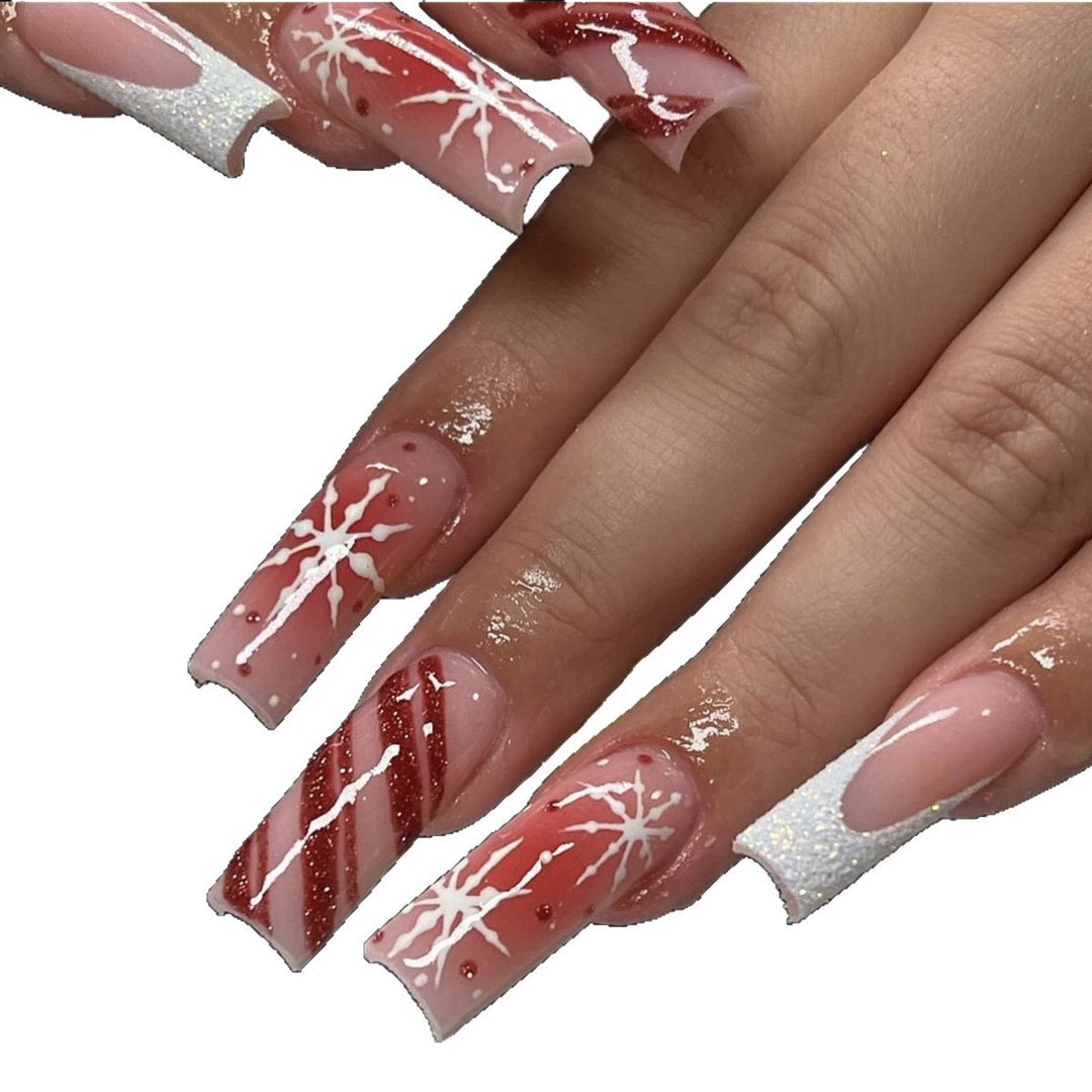 Acrylic nail set with festive candy cane and glitter accents Kalsten