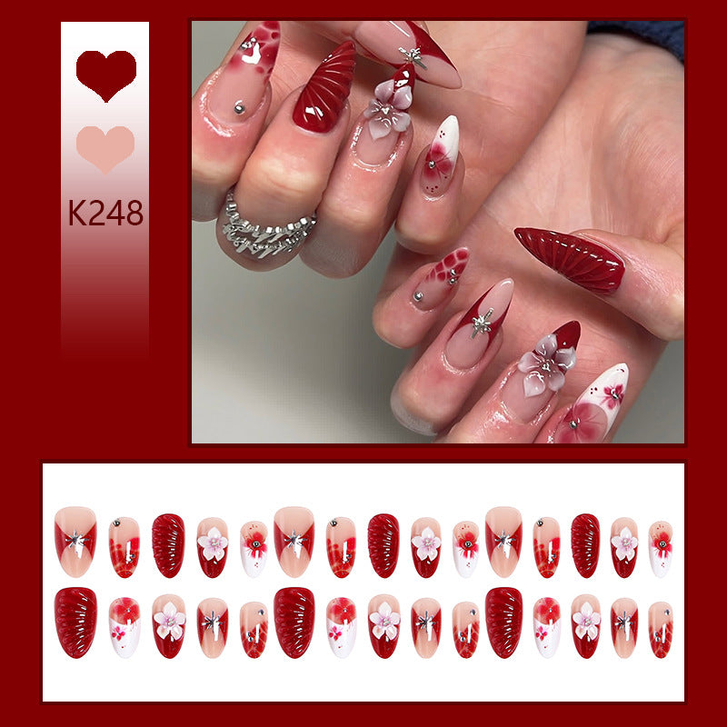 Luxury designed artificial nails with flower accents Kalsten