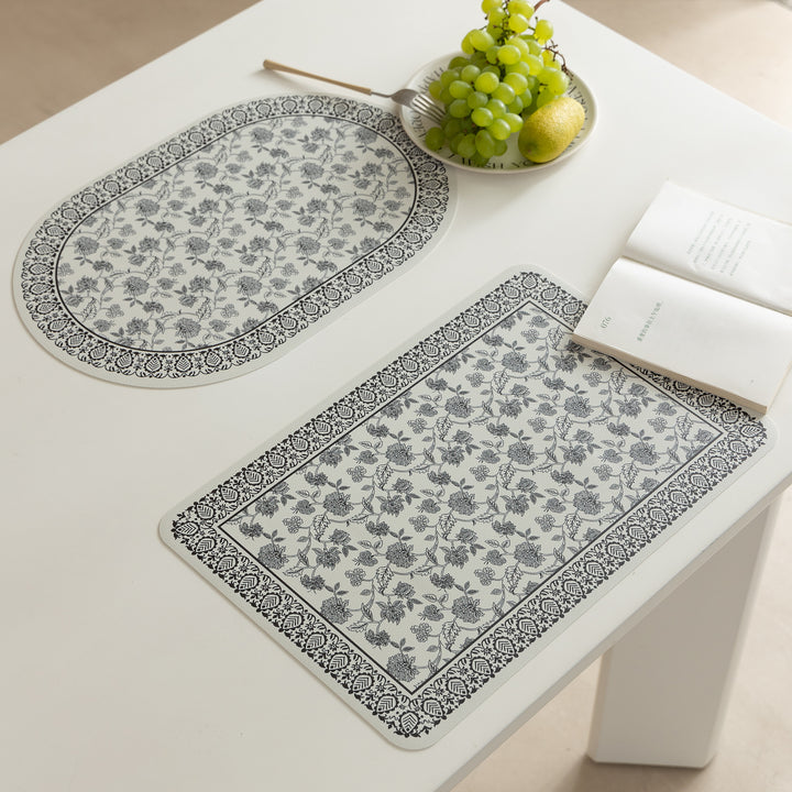 Wipeable table mats made of PU leather with botanical silhouette design Kalsten