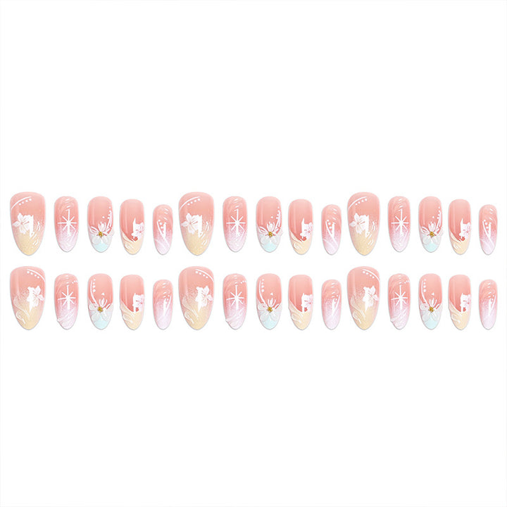 Artificial nail set with intricately detailed floral designs and shine accents Kalsten