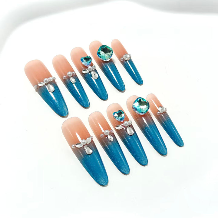 Artificial nails with glitter and rhinestone embellishments Kalsten