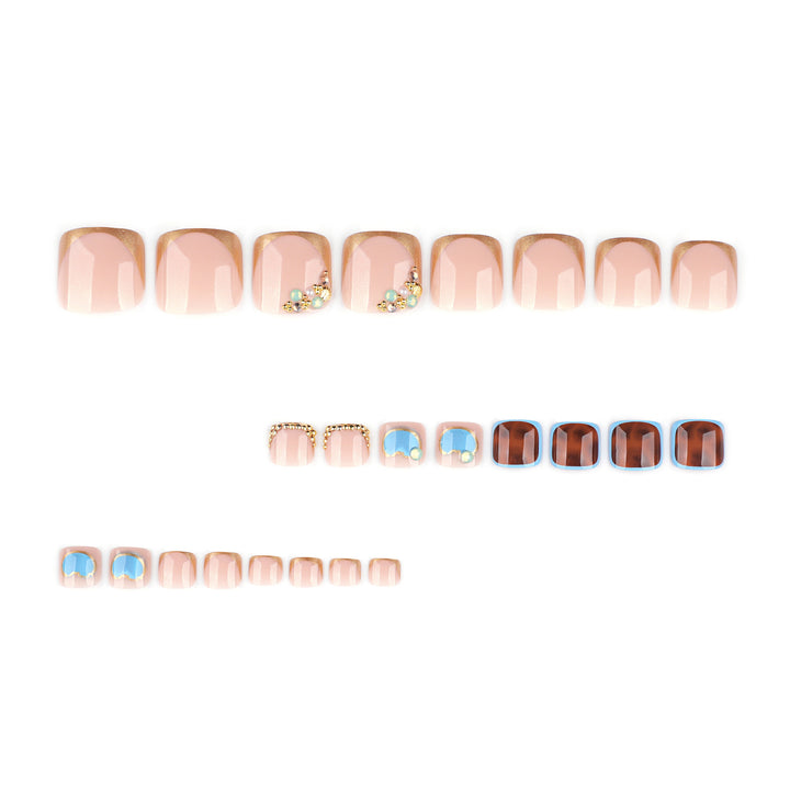 Artistic toenail art with elegant gold design Kalsten