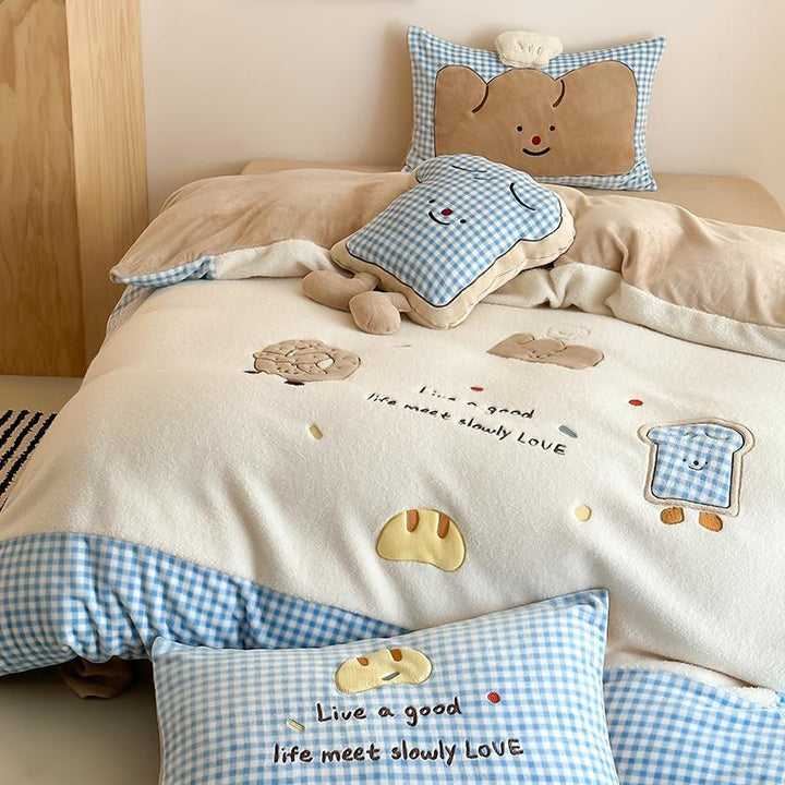 Children's bedding set with quilted cozy blanket, plush decorative pillow, and vichy check trim