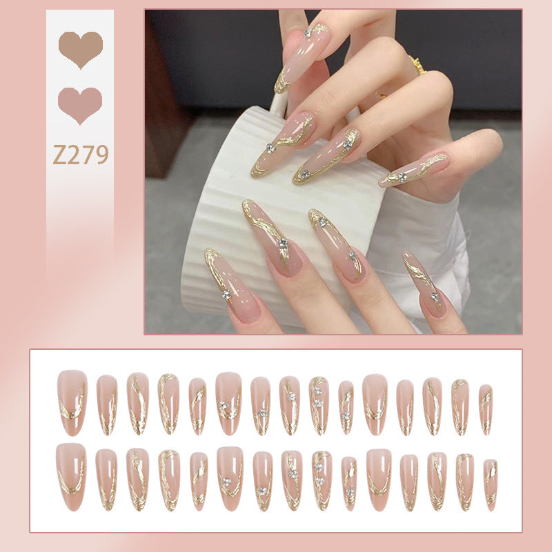 Artificial nail set with elegant gold design and sparkling applications Kalsten