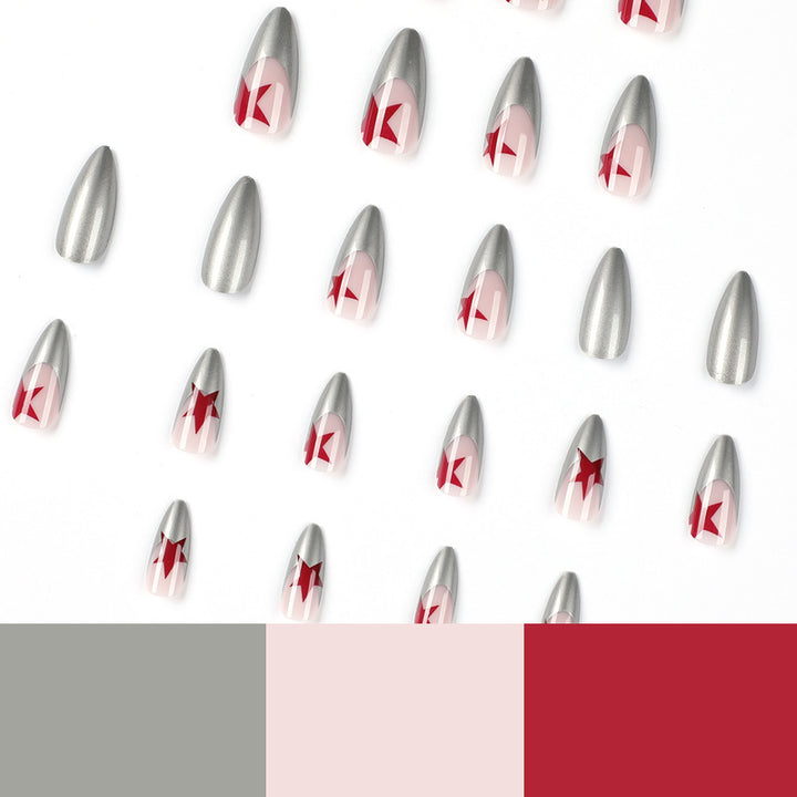 Artful stiletto nails with silver and star motifs Kalsten