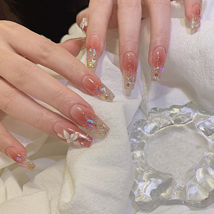 Artificial nail set with floral and glittering accents Kalsten