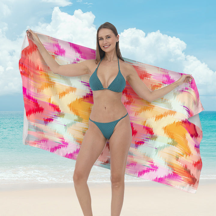 Beach towel with vibrant tropical plant motif Kalsten