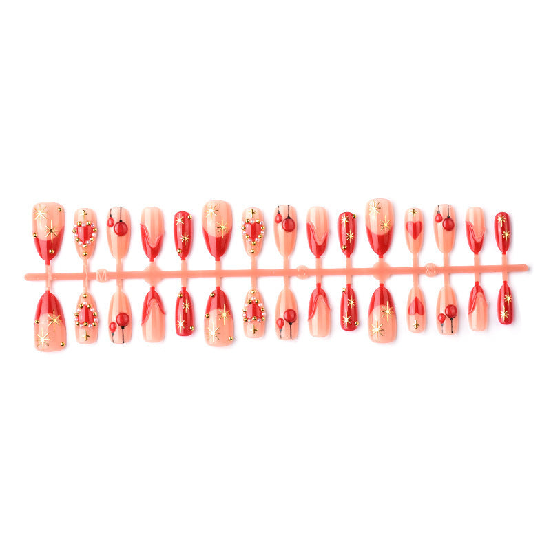 Elegant artificial nails with romantic gold and pearl embellishments Kalsten