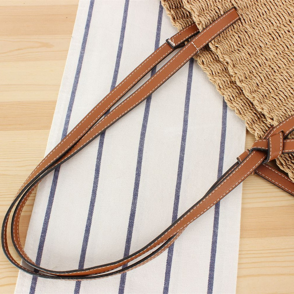 Beach bag made of handwoven natural material with sturdy leather straps Kalsten