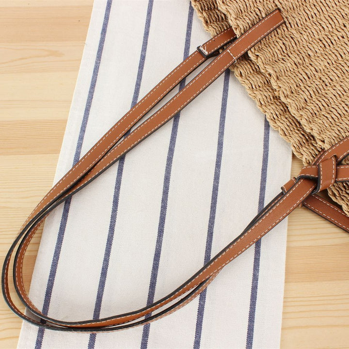 Beach bag made of handwoven natural material with sturdy leather straps Kalsten
