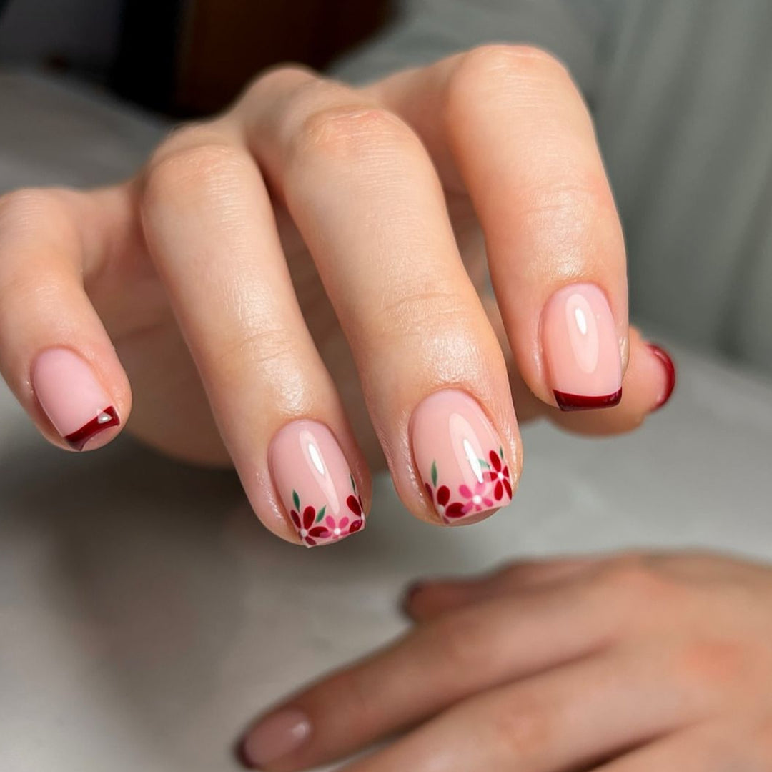 Artful nail design with flower and gradient effects Kalsten