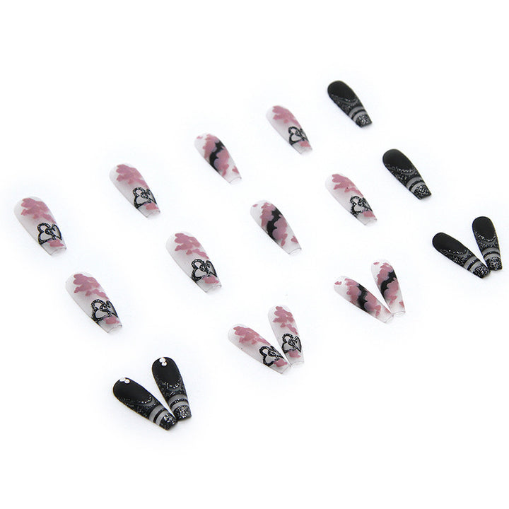 Artificial nail set with creative 3D elements and sparkling accents Kalsten