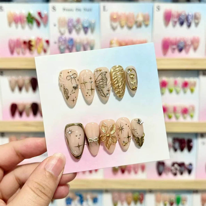 Artistic Press-On Nails Set with Gold and Floral Embellishments