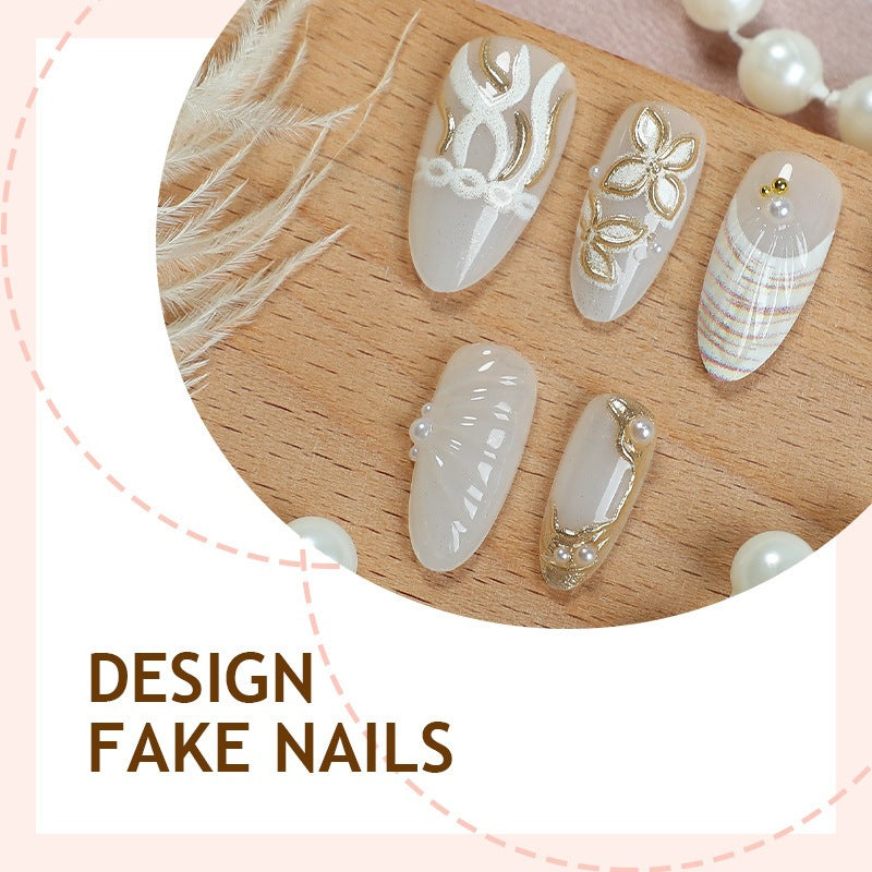 Artificial nail set with filigree gold accents and elegant designs Kalsten