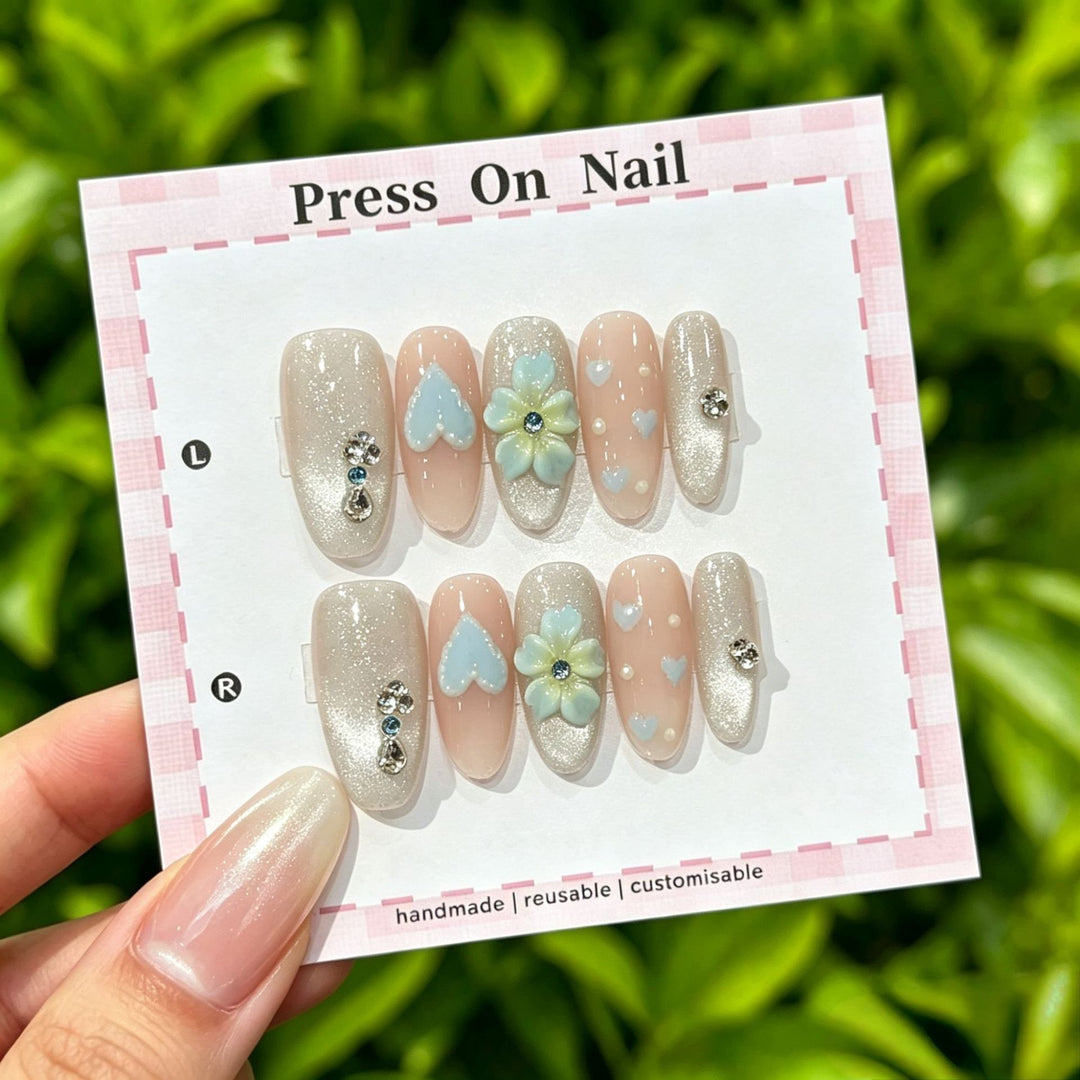 Artistic Press-On Nail Art Set with Cute Character and Bow Accents