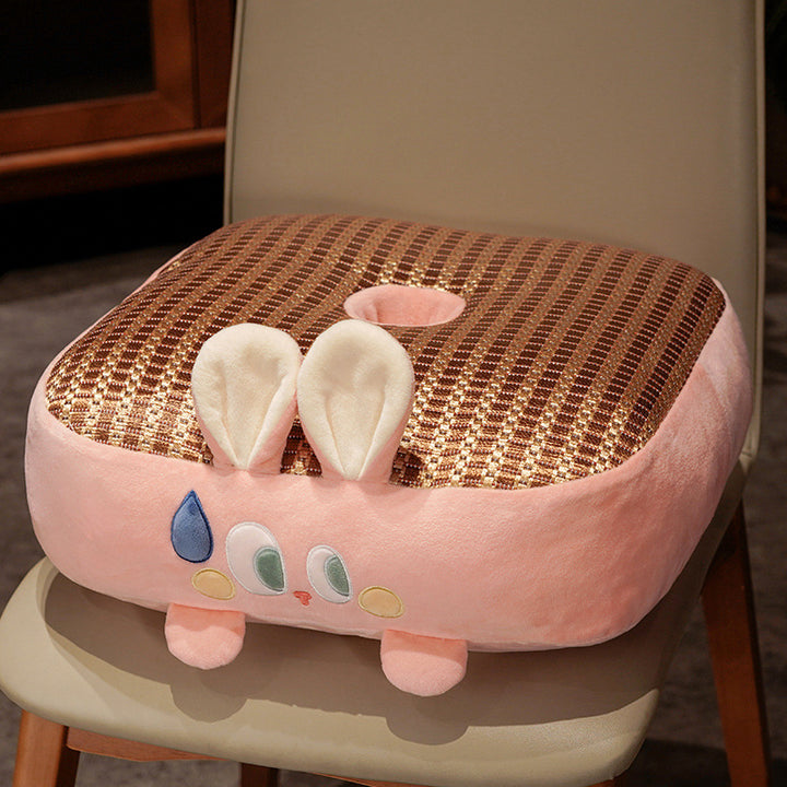 Plush pet bed with raised edge and removable cuddly pillow