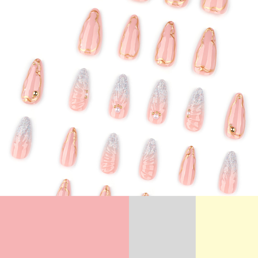 Artful stiletto nails with elegant gold embellishment design Kalsten