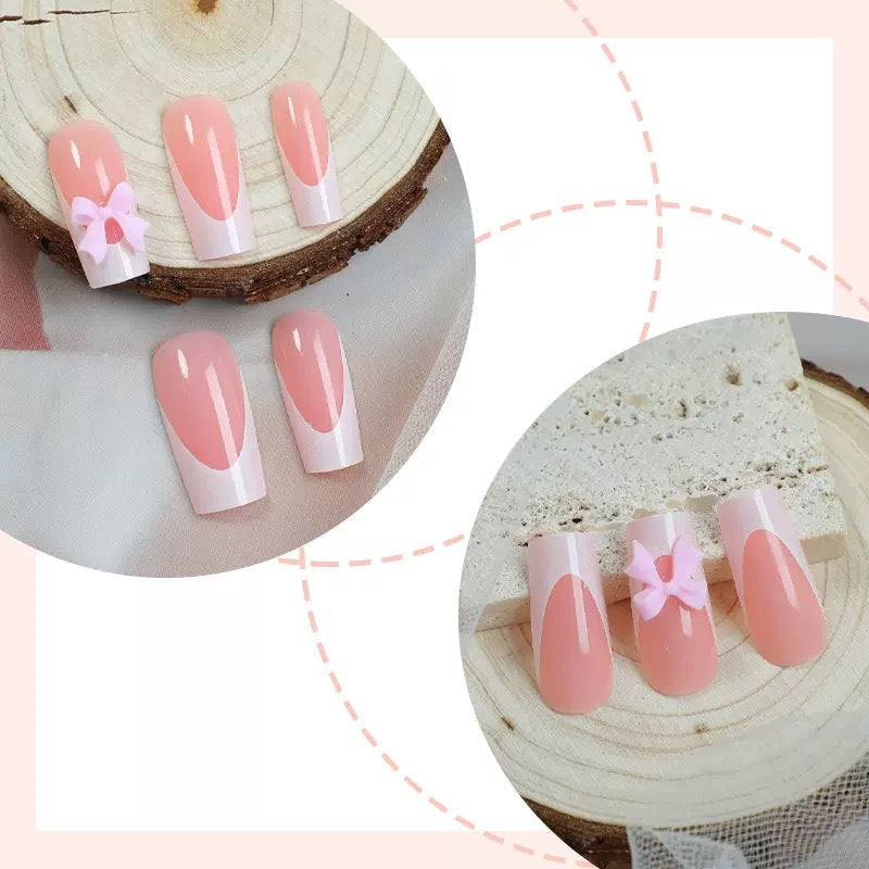 Nail set with playful bow design Kalsten