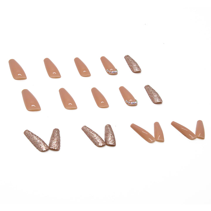 Glamorous artificial nail extensions with rhinestone and glitter details Kalsten