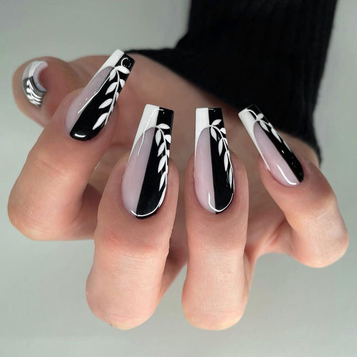 Artful nail extensions in elegant black and white design Kalsten
