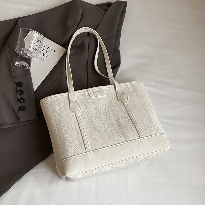Elegant Textured Tote Kalsten