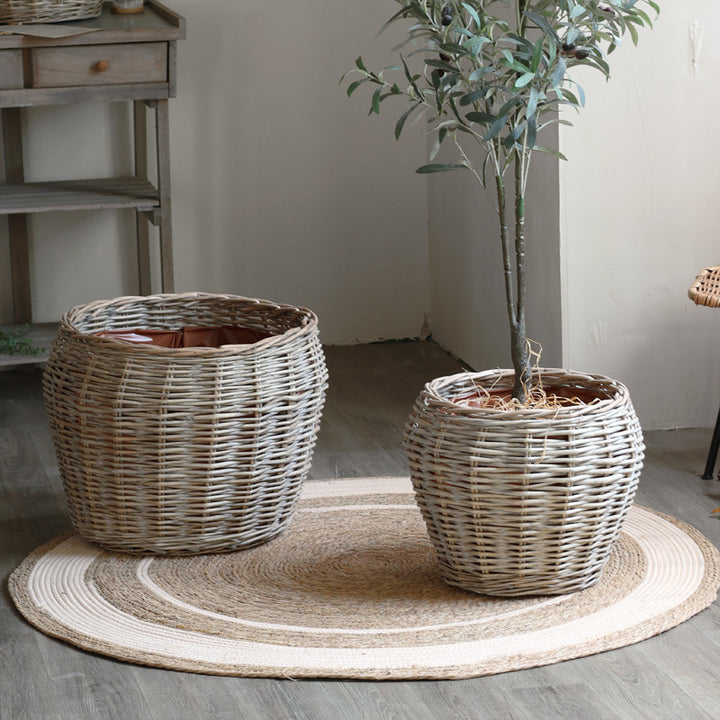 Stylish laundry basket made of braided natural material Kalsten