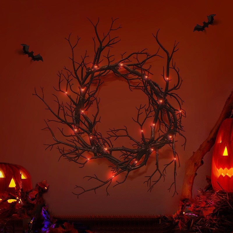 Halloween decorative wreath made of artificial branches with a natural branch look