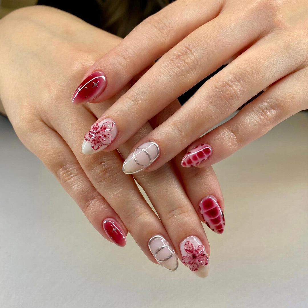 Artificial nails with floral accents and modern patterns Kalsten