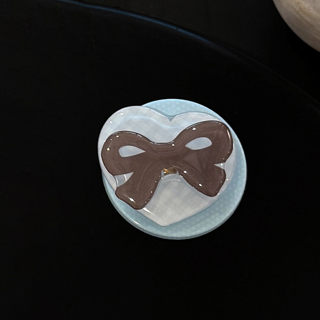 Decorative ceramic coaster with bow motif Kalsten