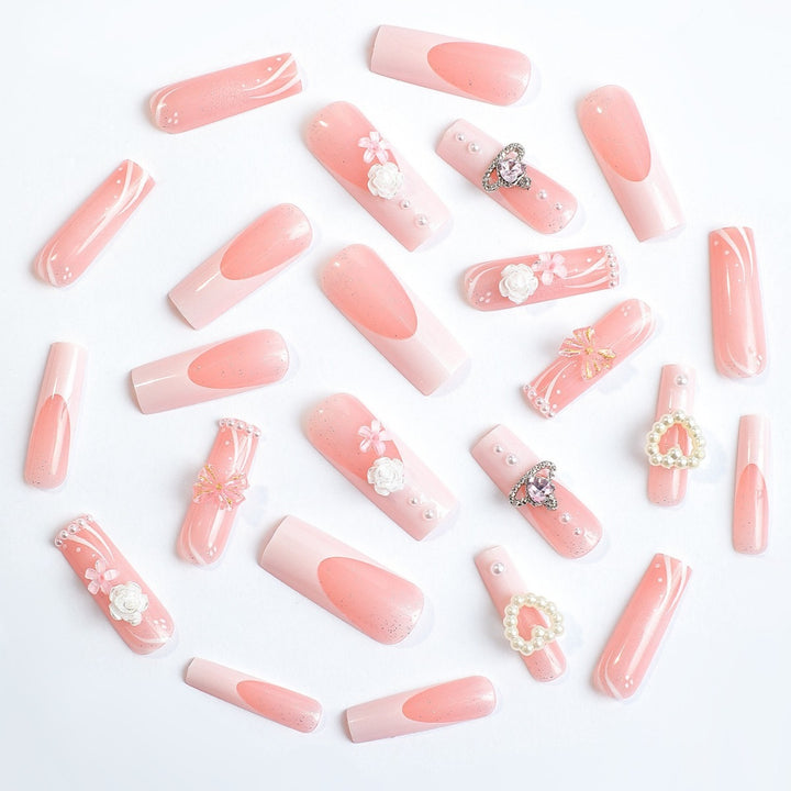 Elegant artificial nail set with glitter and floral accents Kalsten