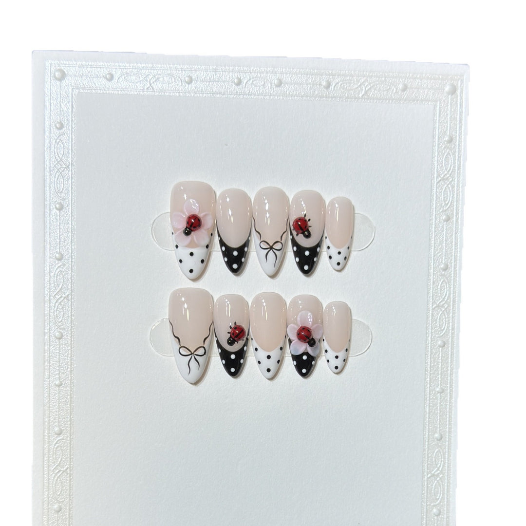 Artistic Stiletto Press-On Nail Set with Floral and Insect Designs Kalsten