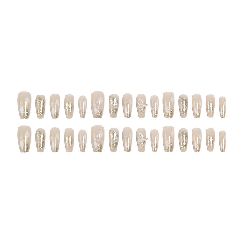 Glamorous artificial nails with heart-shaped accents Kalsten