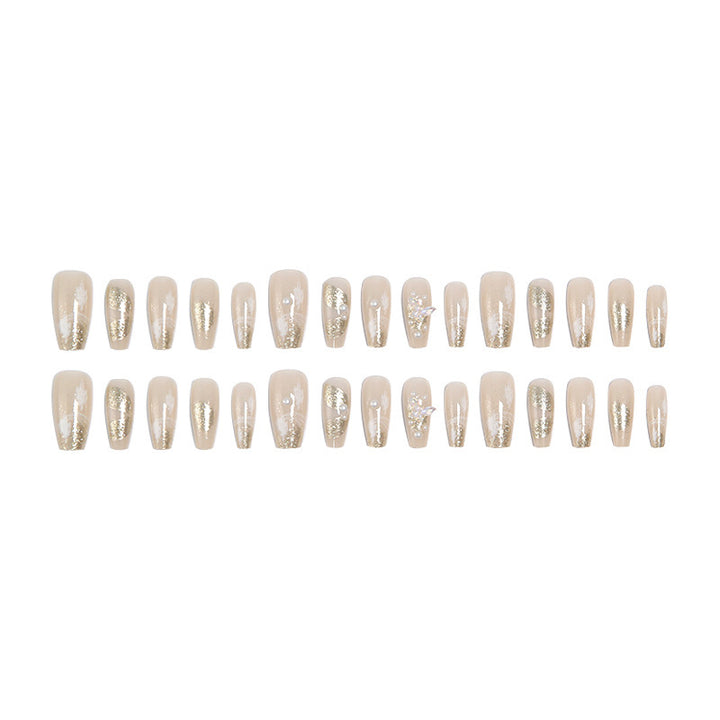 Glamorous artificial nails with heart-shaped accents Kalsten