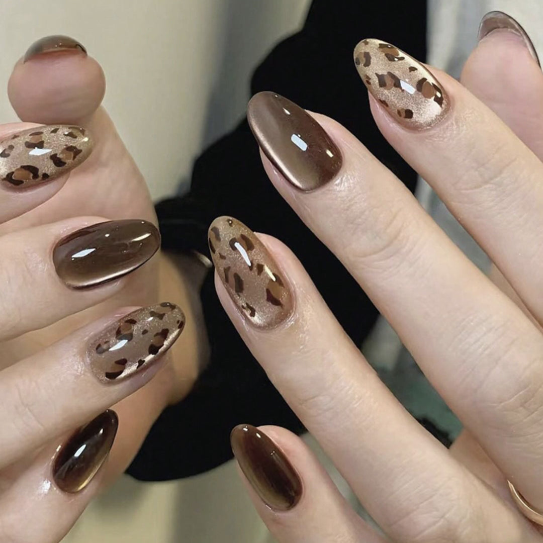 Artful nail extensions with unique leopard pattern and shine Kalsten