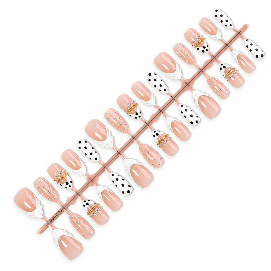 Artificial artificial nails with fashionable dots and embellishments Kalsten