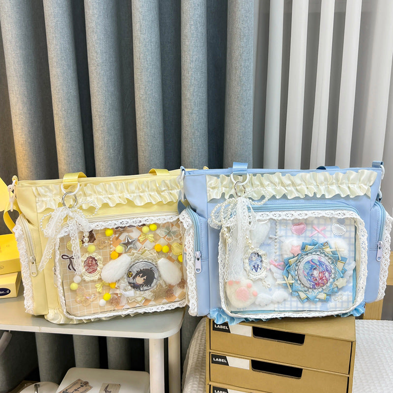 Shoulder bag with transparent front and playful applications Kalsten
