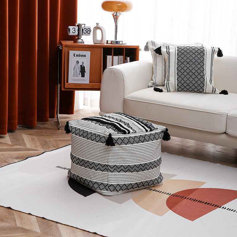 Square Boho seat pouf made of woven cotton blend with tassels and removable cover Kalsten