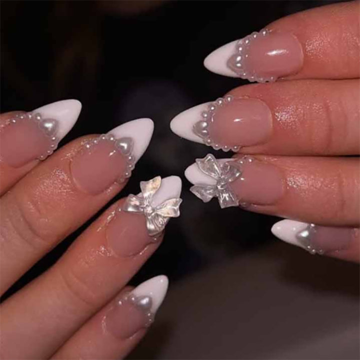 Artful Nail Extensions with Bead and Bow Designs Kalsten