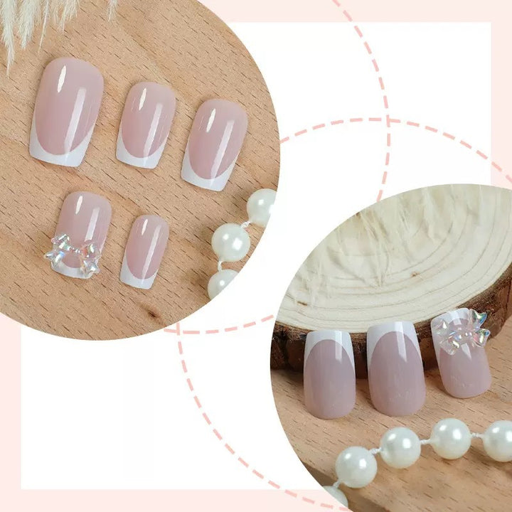 Artificial nail set with glamorous French tips and sparkling accents Kalsten