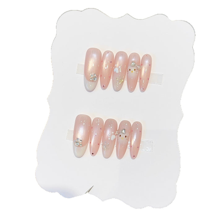 Artificial nail tips with playful penguin and paw print design Kalsten